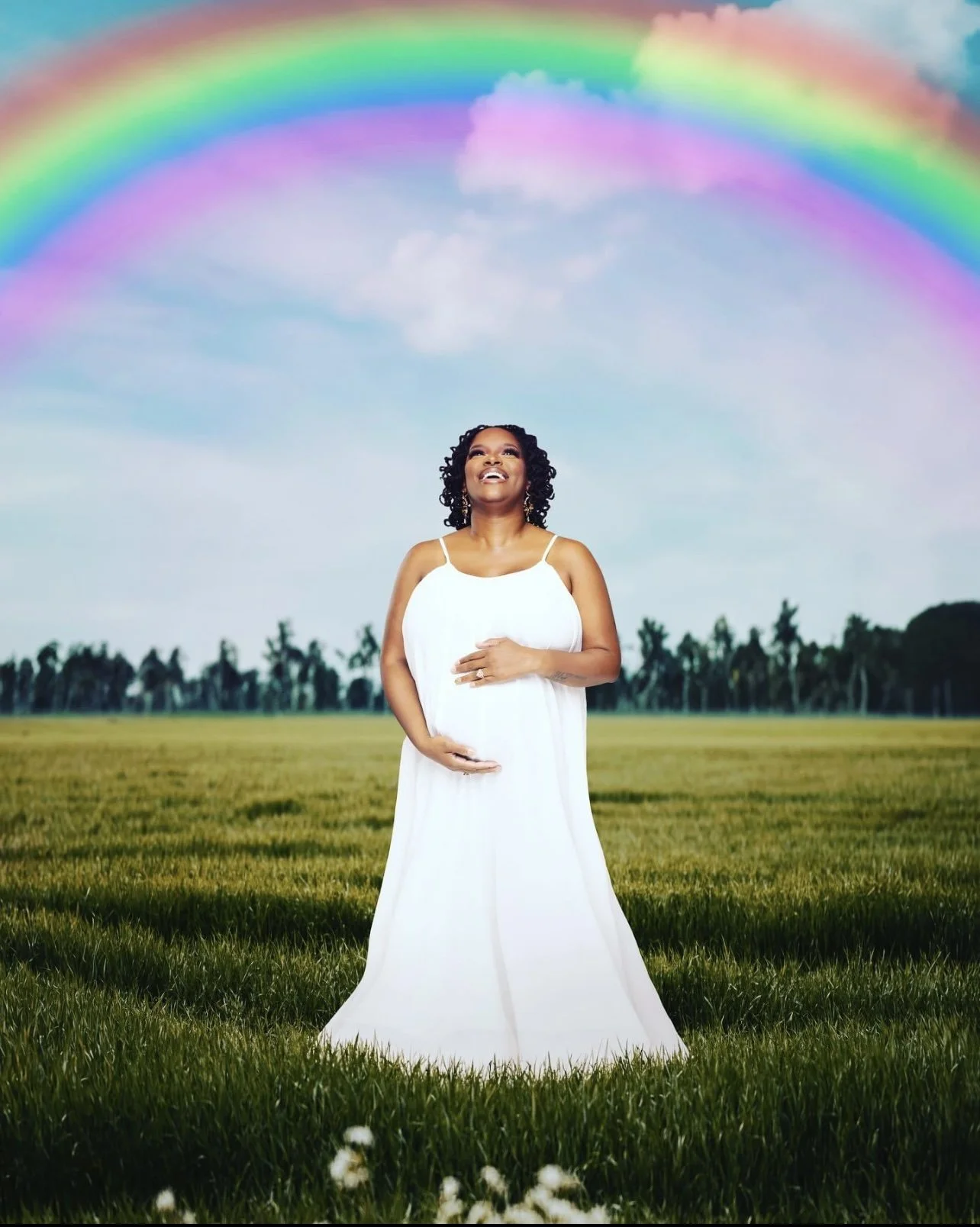 Pregnant woman looking toward the sky