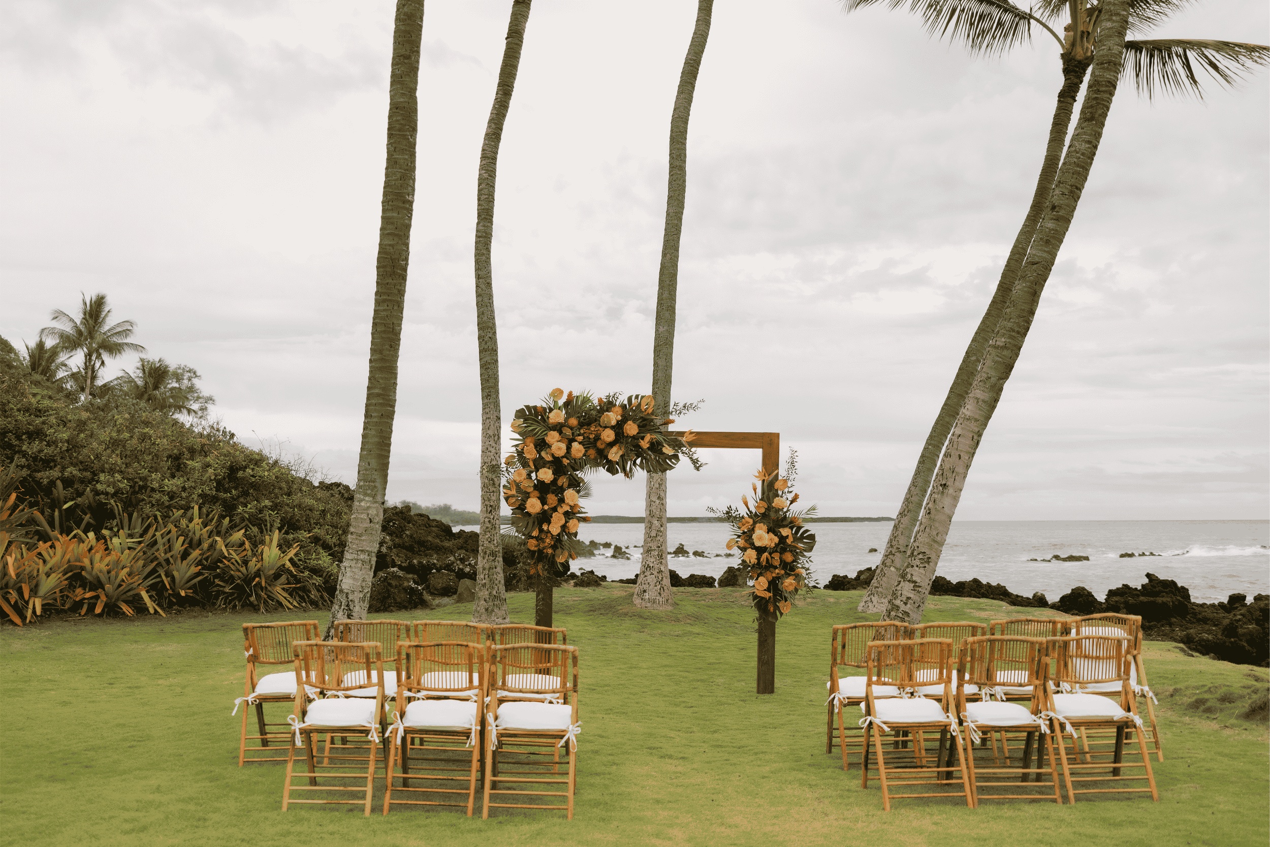 white-orchid-beach-house-tropical-floral-wedding-arch.jpg.png