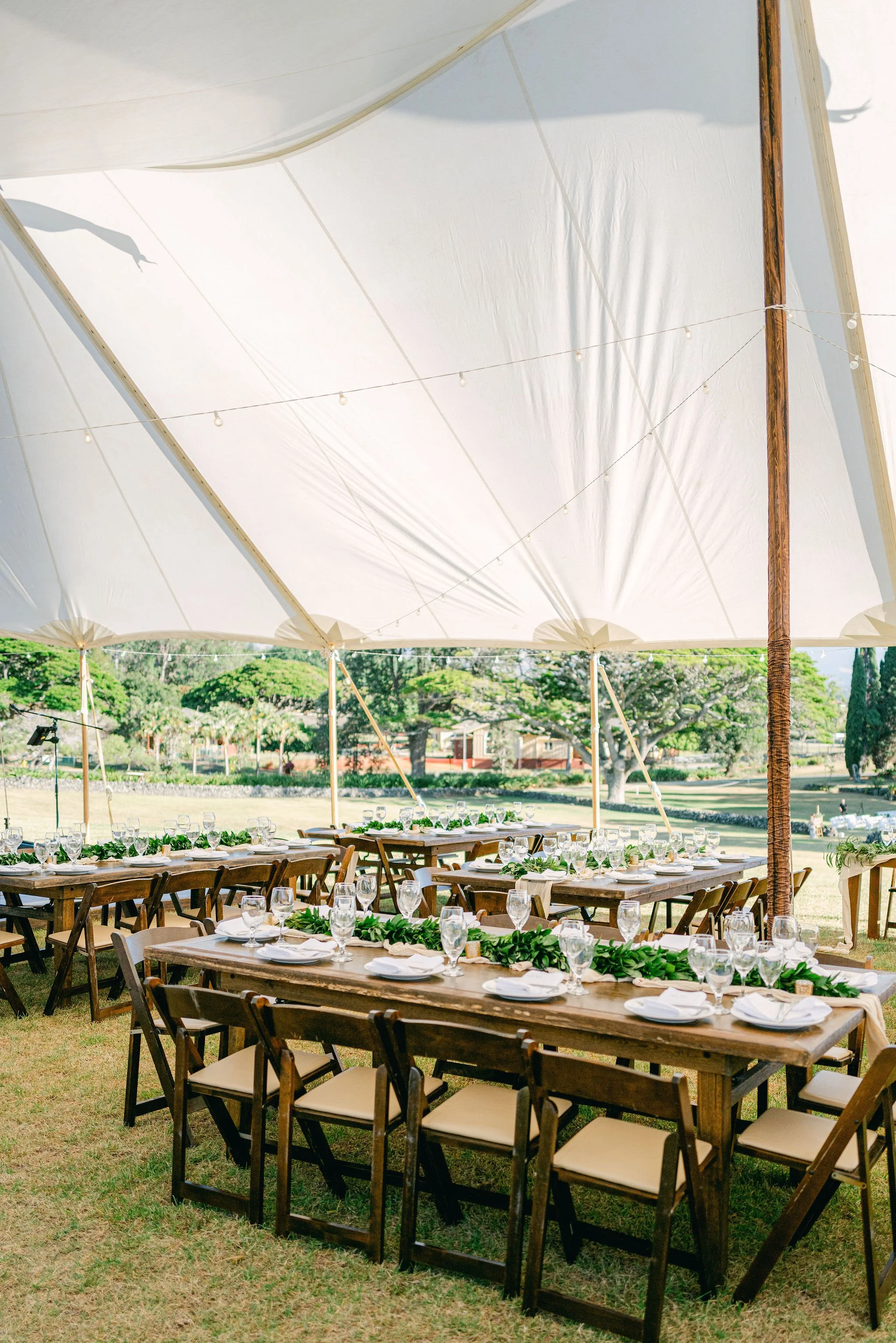 hui-noeau-visual-arts-center-tented-wedding-reception-tables.jpg