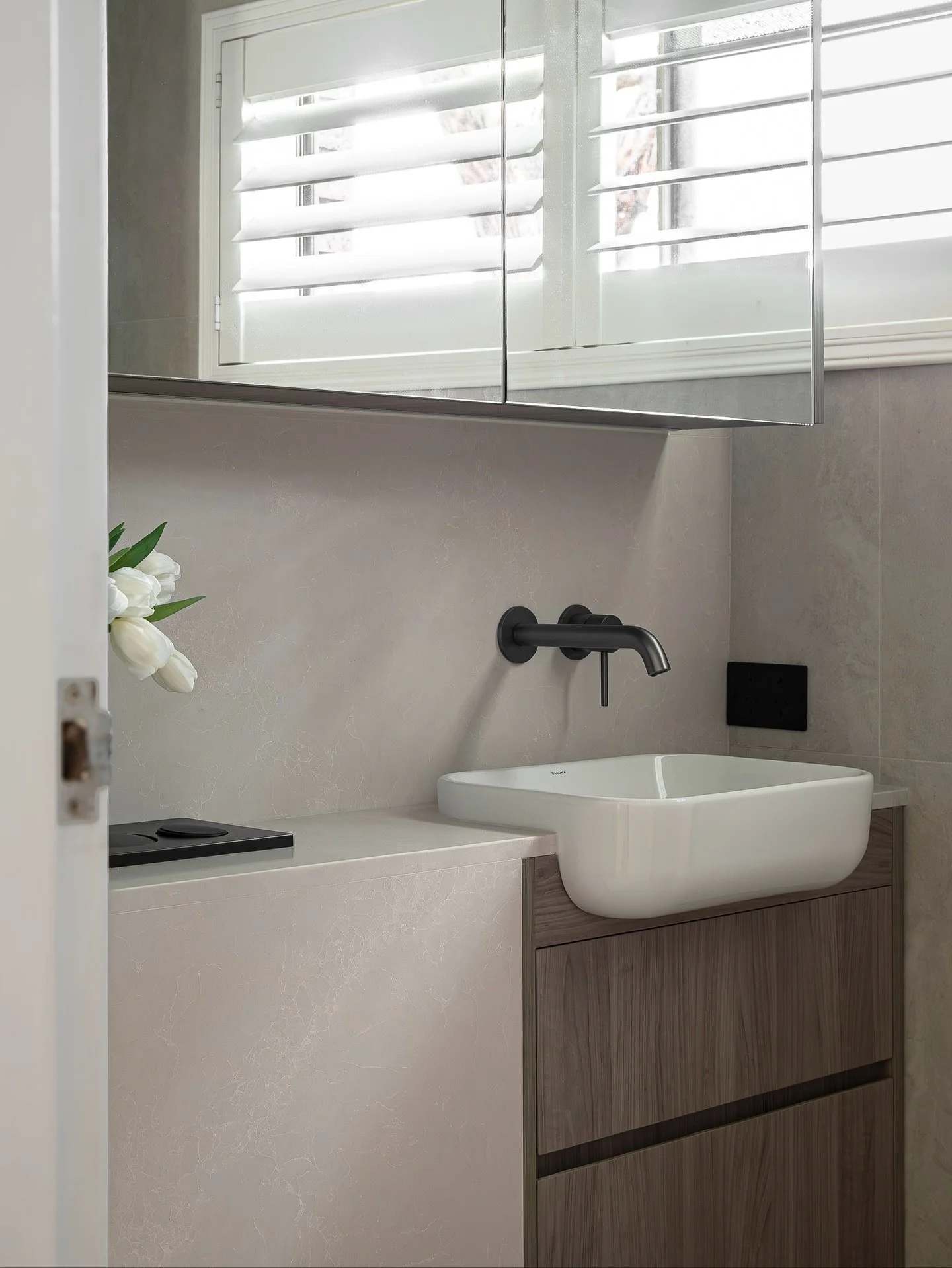 Check out the before photos at the end 👉🏻

One of the biggest parts of renovation is working with what&rsquo;s already there. 

In this bathroom, the louvered windows ran right into the corner, leaving the space difficult to use. 

With some though