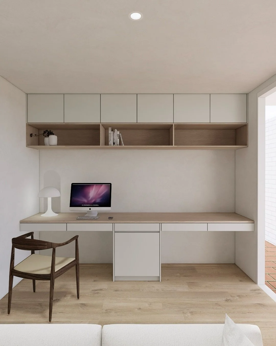 Our client came to us with a simple but meaningful request - he wanted a home office where he could focus, unwind, and feel inspired.
This room used to be an old garage, later converted into a basic office and storage space (see the before photo at