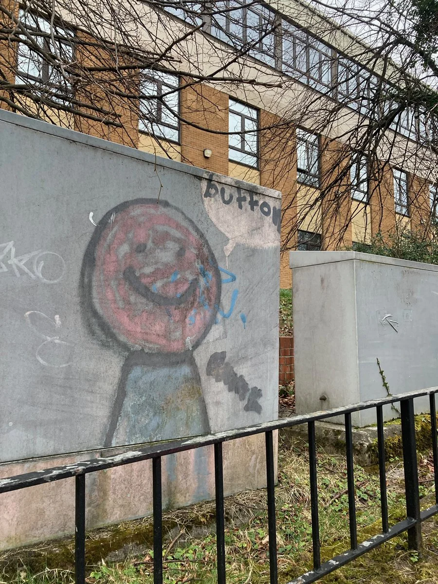 Photo of grafitti character with smiley face Glasgow