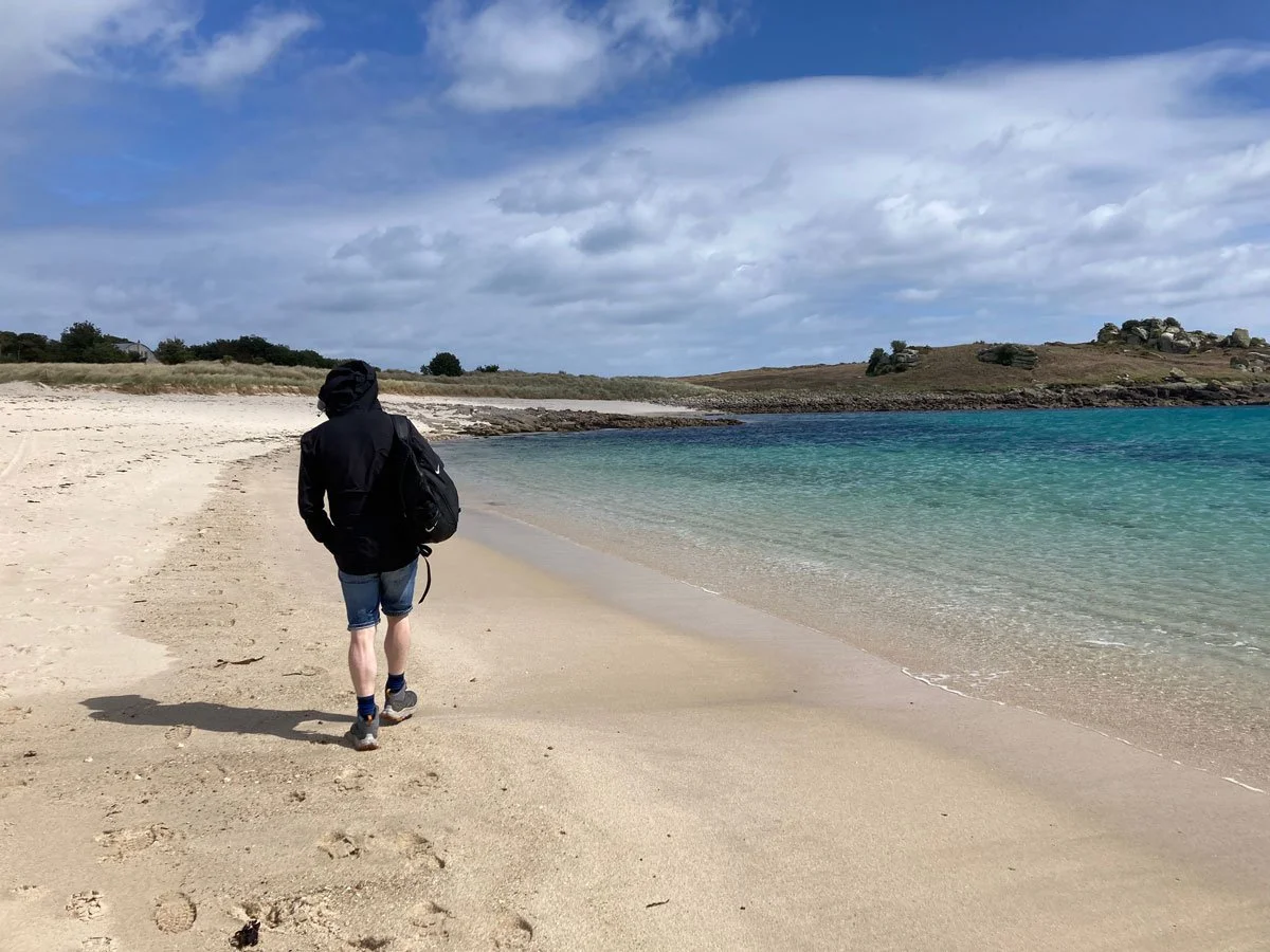 Man walking on beach St Agnes