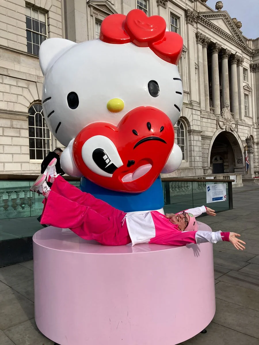 Louise Yeo posing under the Hello Kitty scuplture outside Somerset House, London