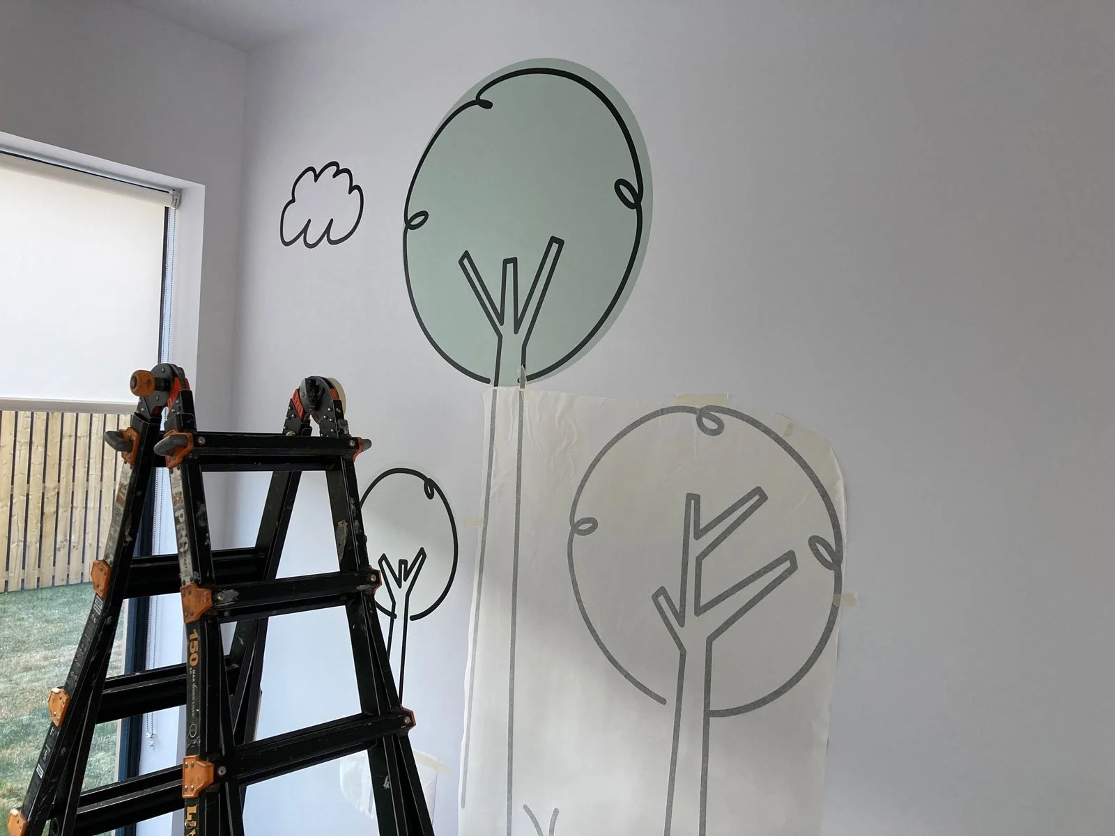 Wall with tree graphics applied in vinyl - design by VS+YO