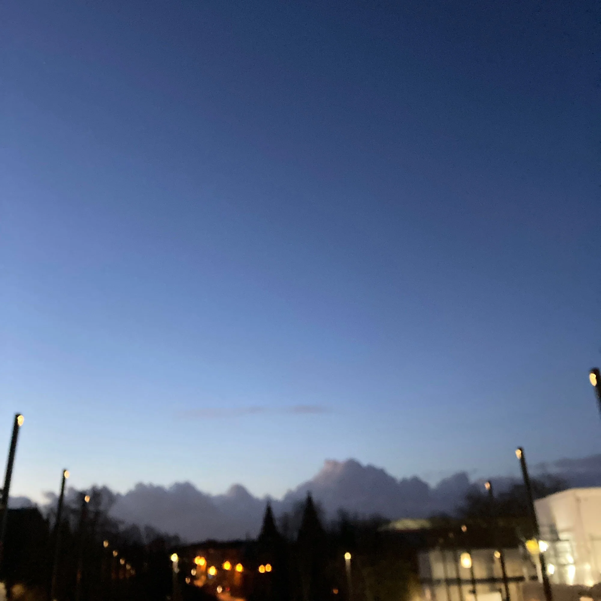 Blurry photo of Glasgow skyline at dawn