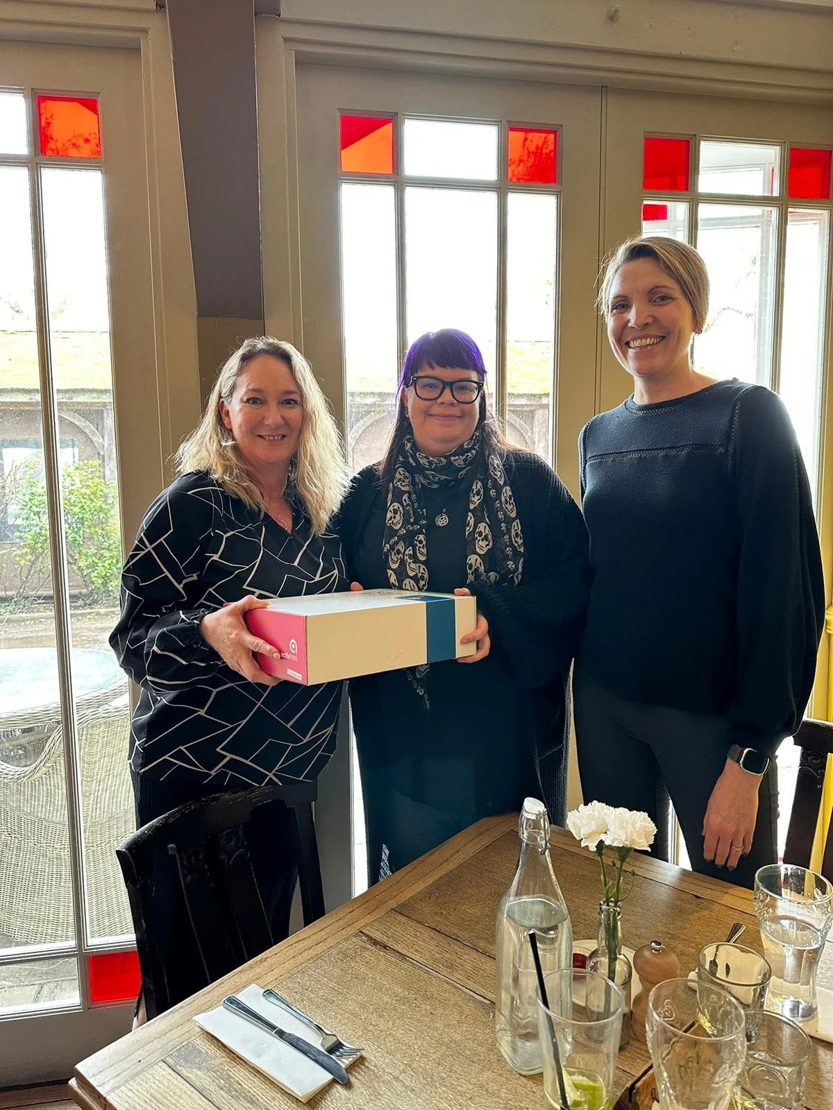 Liz and team receiving a national award 2024