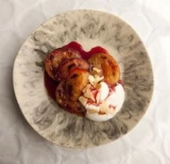 Poached Plums Served with Greek Yogurt and Toasted Pistachios