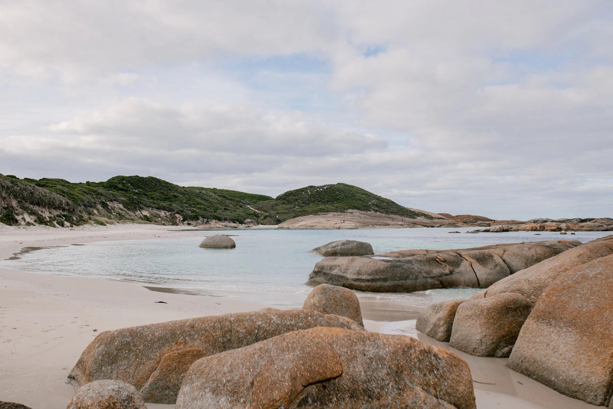 Panoramic coastal landscape of Elephant Rocks, with its iconic granite boulders and turquoise waters in William Bay National Park near Denmark, Western Australia.