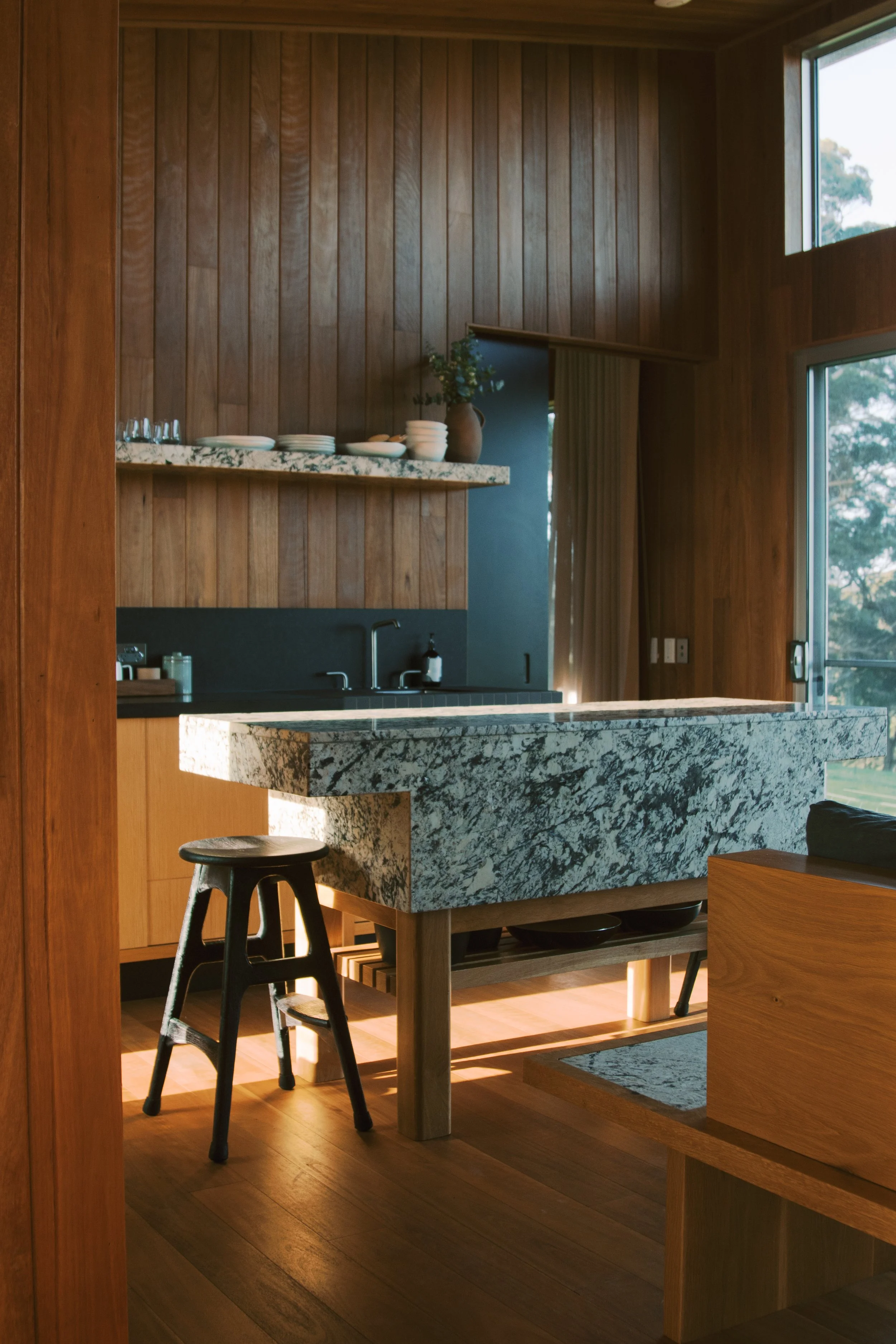 The thoughtfully designed kitchen in Cabin Forest, a one-bedroom couples retreat at Upland Farm in Denmark, Western Australia.