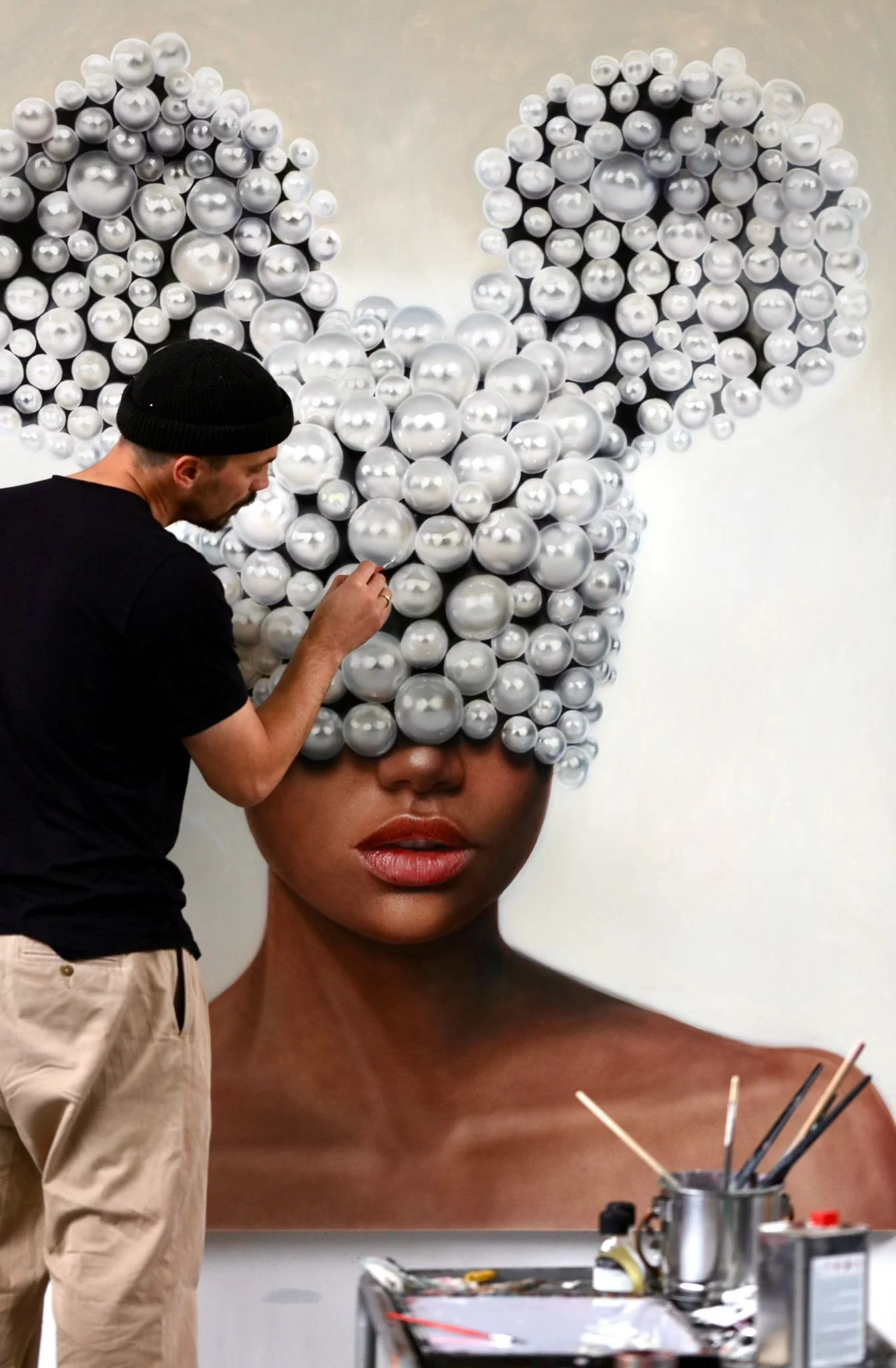 David Uessem painting 'White Aura' in his studio