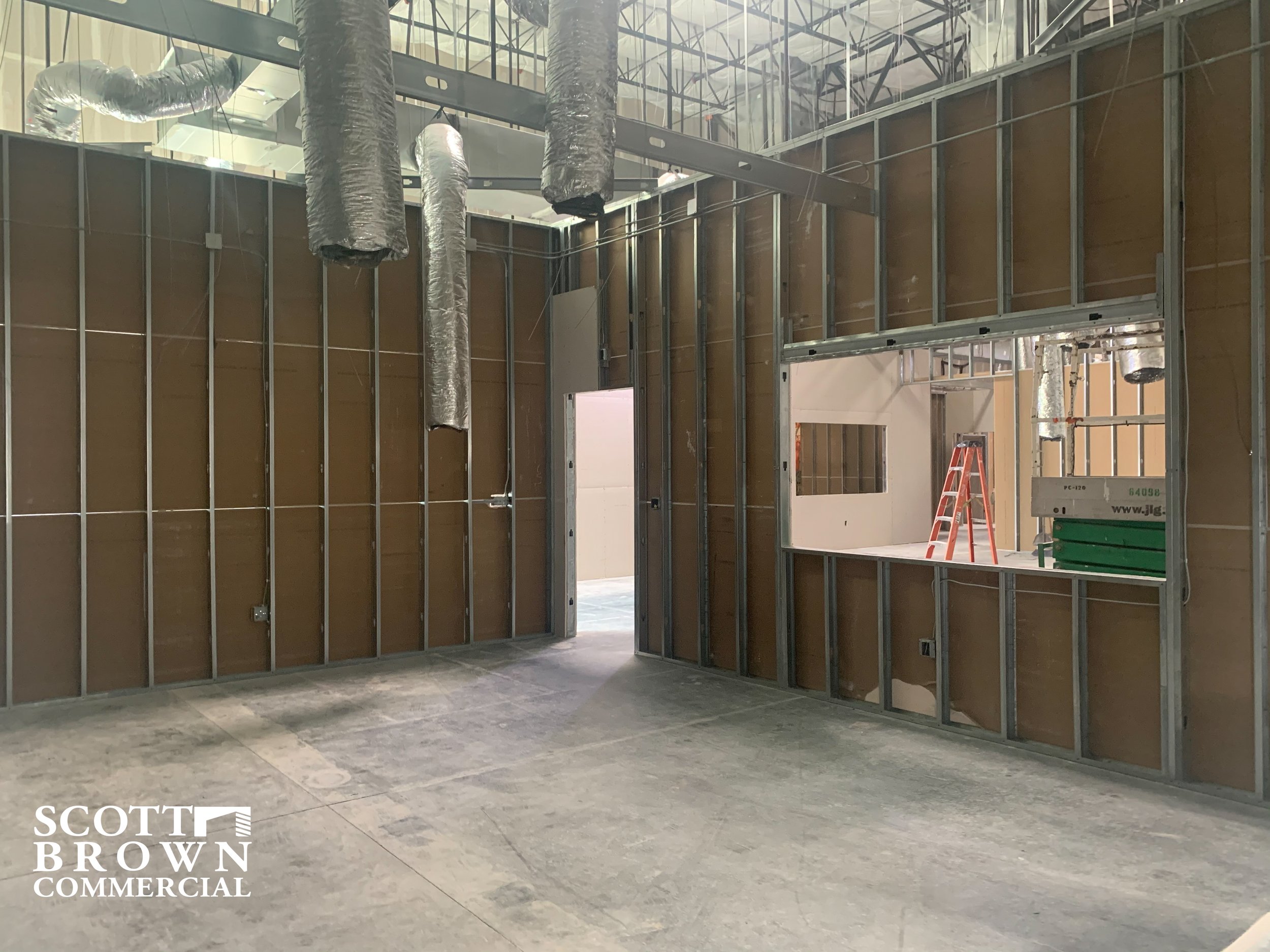  partially built office partition at 1550 N Western Blvd with hvac ducts 
