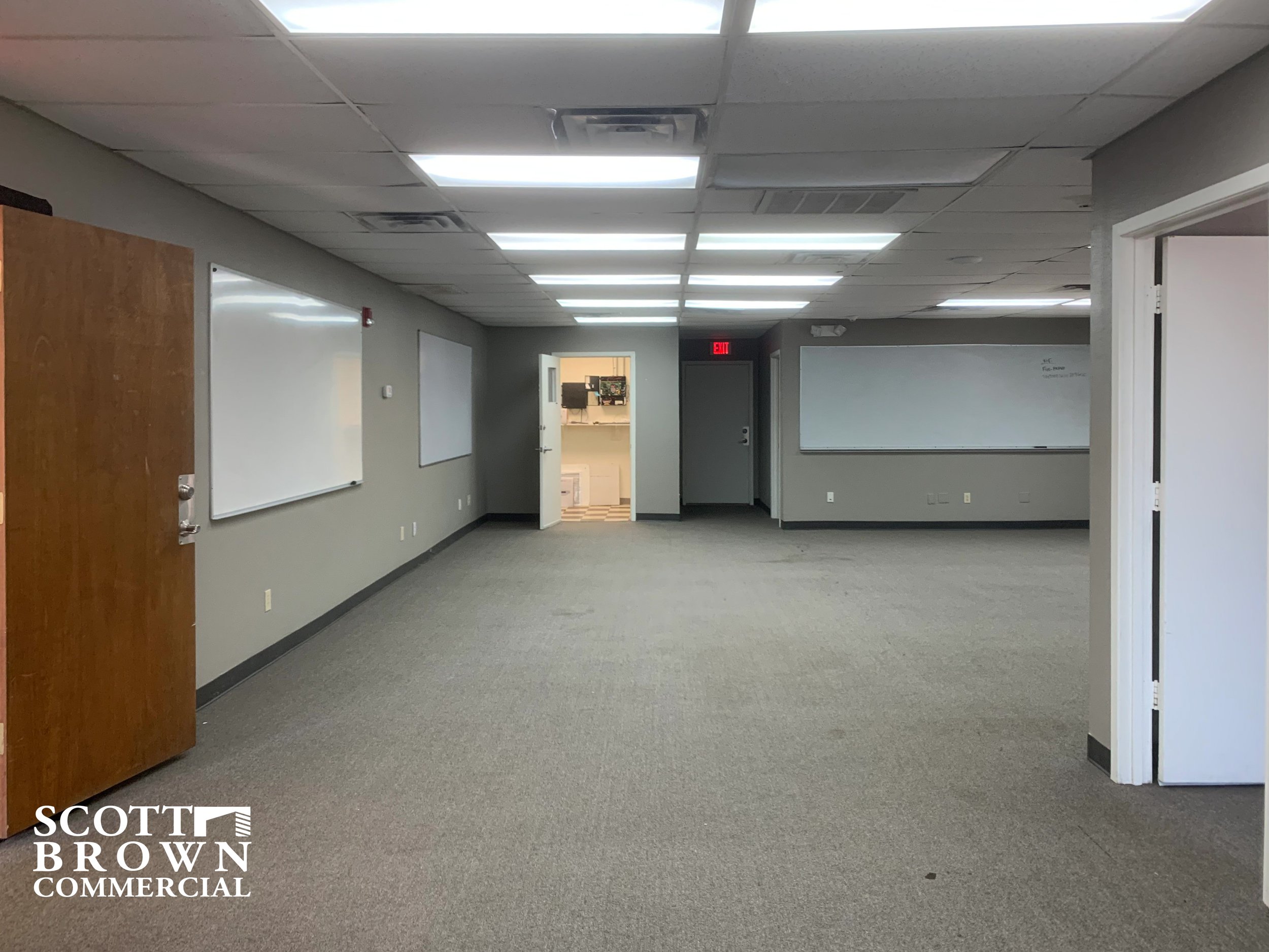  large open office space with grey walls in 400 S Carroll Boulevard 