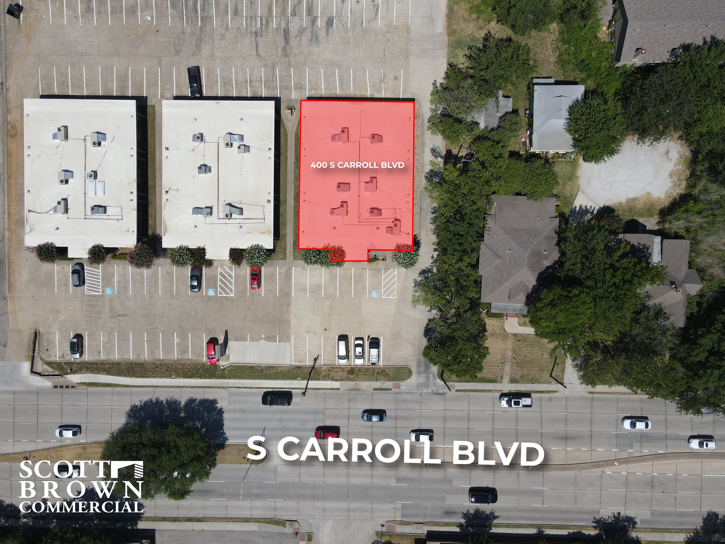  top down view of the parking lot with 400 S Carroll Boulevard’s building highlighted in red 