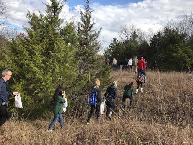  A group of students from Nolan HS gathered privet berries along the hike for disposal. 