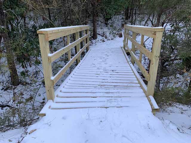  A bridge to somewhere! First snow for one of the new bridges at Tandy HIlls. 