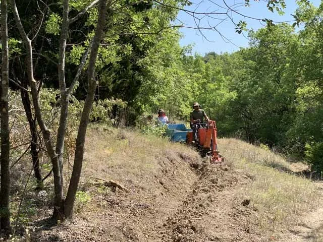  It's not easy getting the machines deep into the park. 