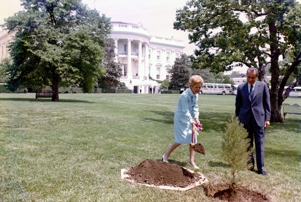  Pat and President, Richard Nixon, planting a tree on the White House lawn on Earth Day in 1970. 