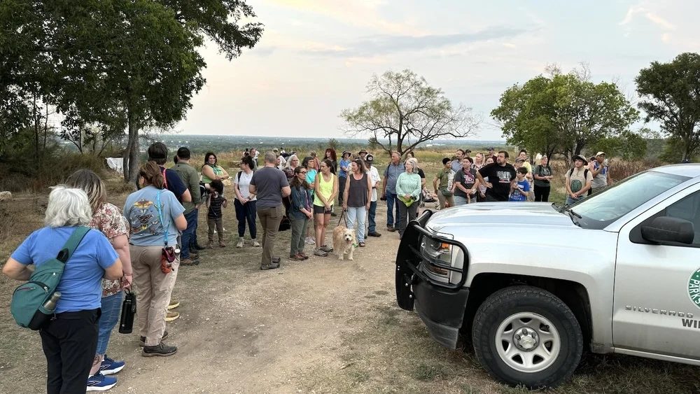  The crowd grew to more than 100 as darkness grew. 