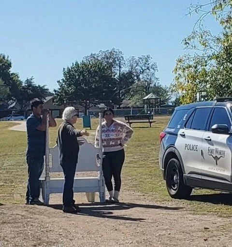  Don Young explaining to a portrait photographer that bringing in large props such as furniture is not allowed at the Natural Area and photo permits are required. 
