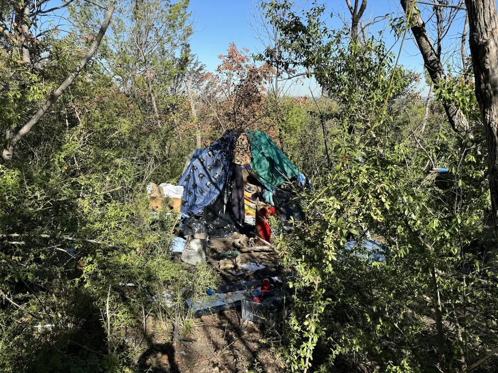  Illegal camps such as this one are very destructive to the natural area. Downed trees, trampled meadows, trash, human waste and illegal fire are a few of the problems. 