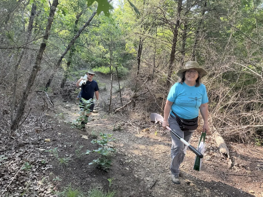   Karen &amp; Chris Harden  hiking to a special spot to install the monitor pole and mic. 