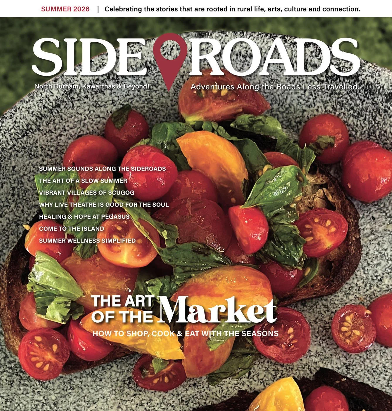 Cover of Sideroads Magazine Summer 2026 issue highlighting a beautiful seasonal dish of heirloom tomatoes and herbs on dark rye