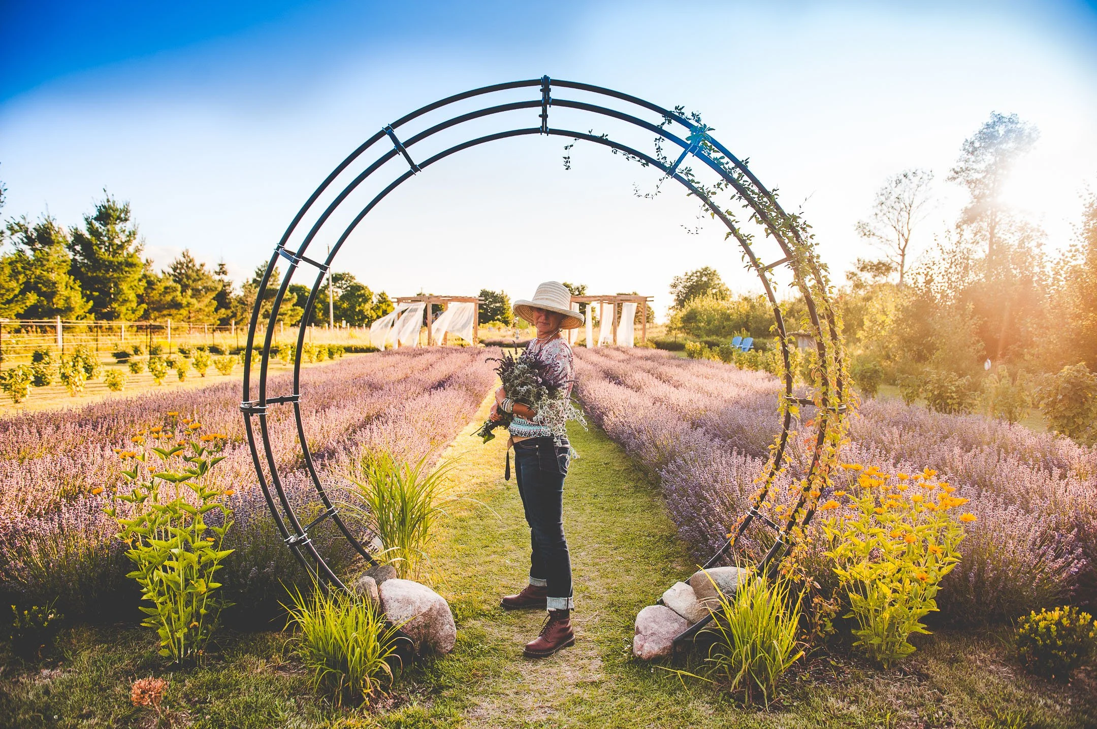 Mila Haynos standing amongst the lavender at Lavender-Blu Lavender and Eco Farm