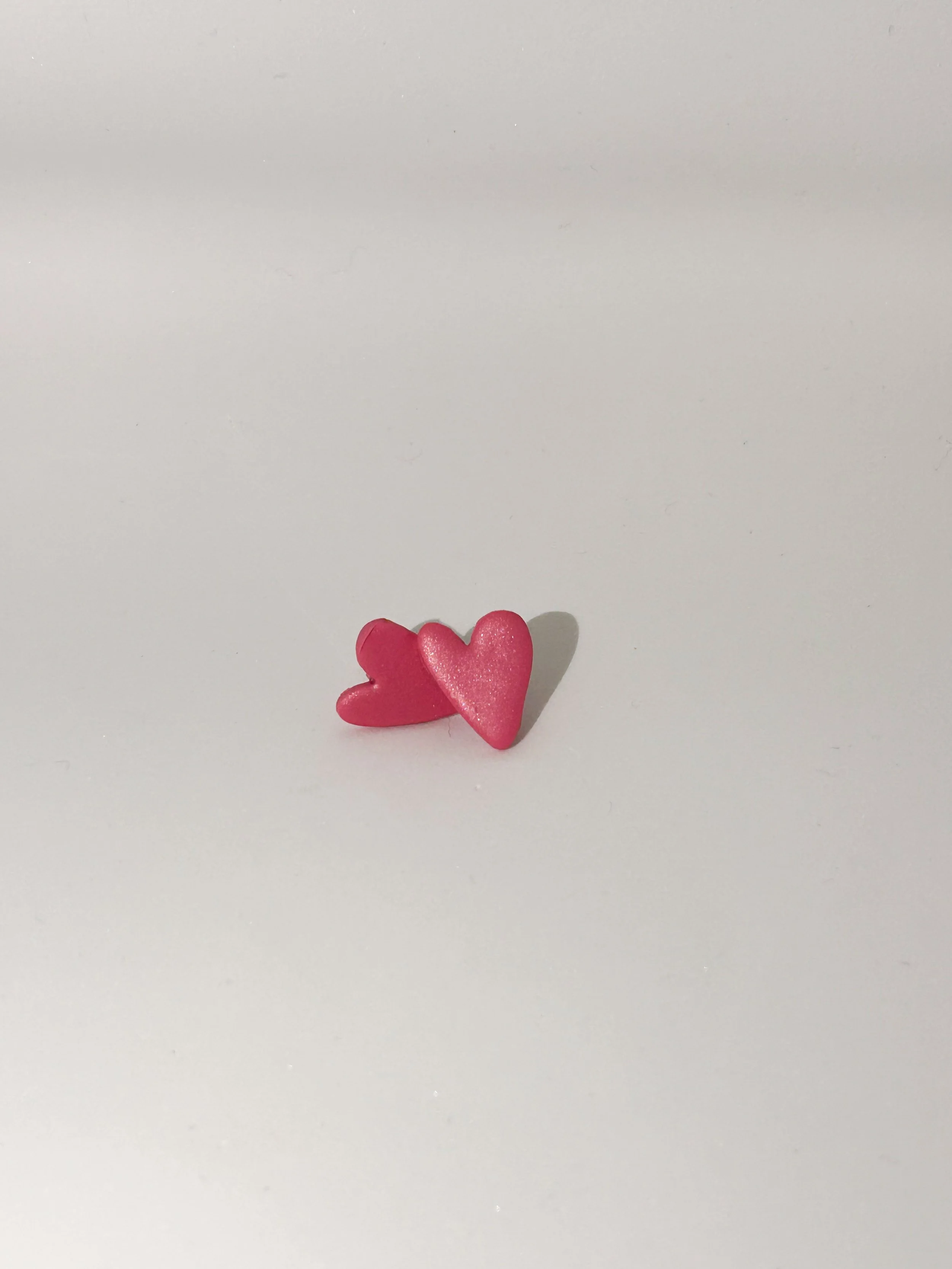Pink Shimmer Wonky Heart Studs