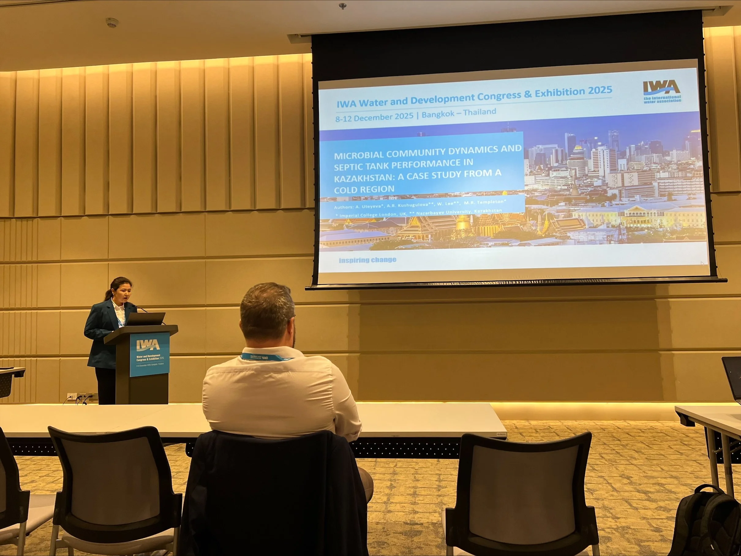 PhD student Aiman Uteyeva delivers presentation on microbial community dynamics and septic tank performance in cold region of Kazakhstan.