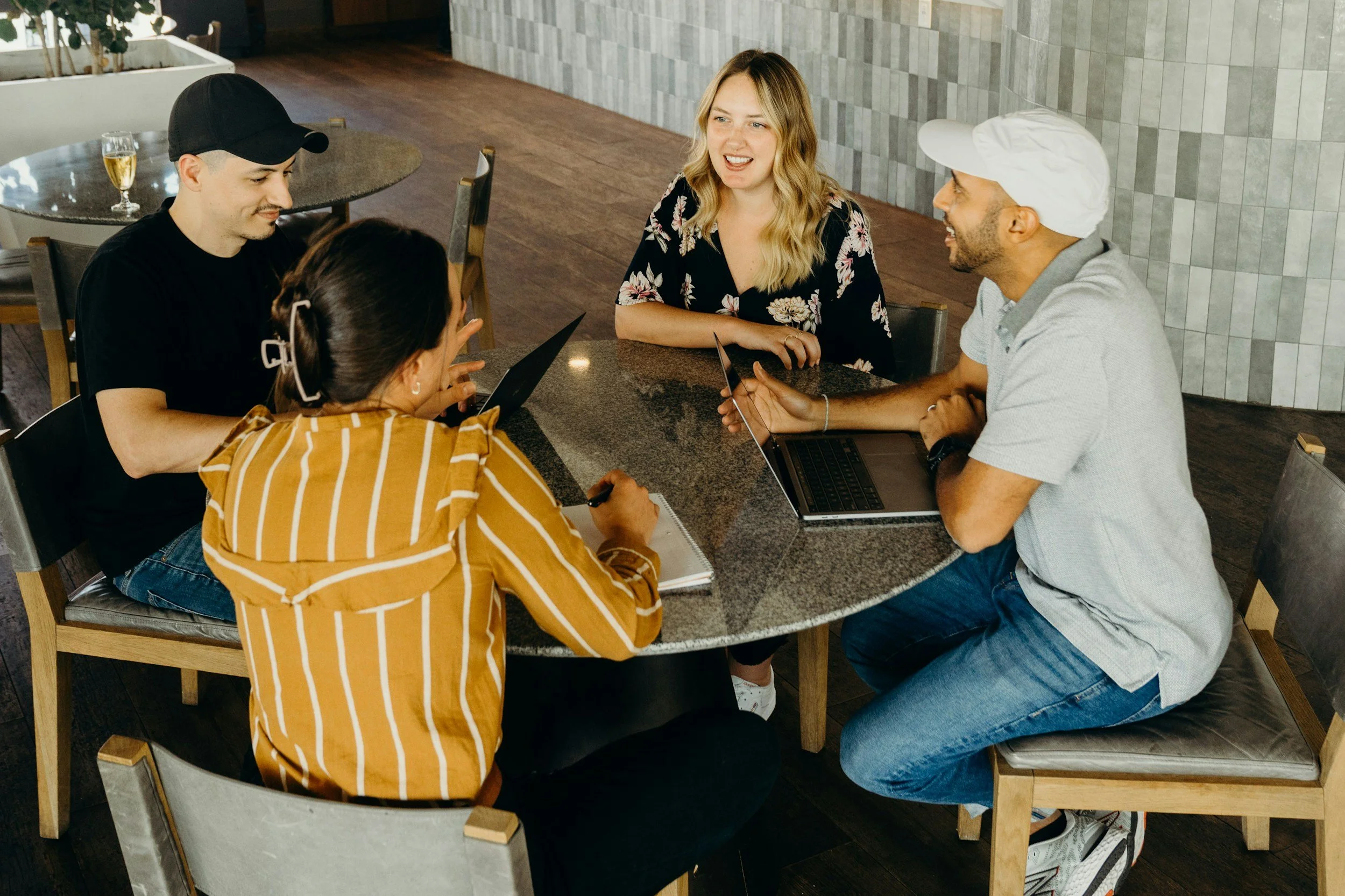 People having a conversation around a table