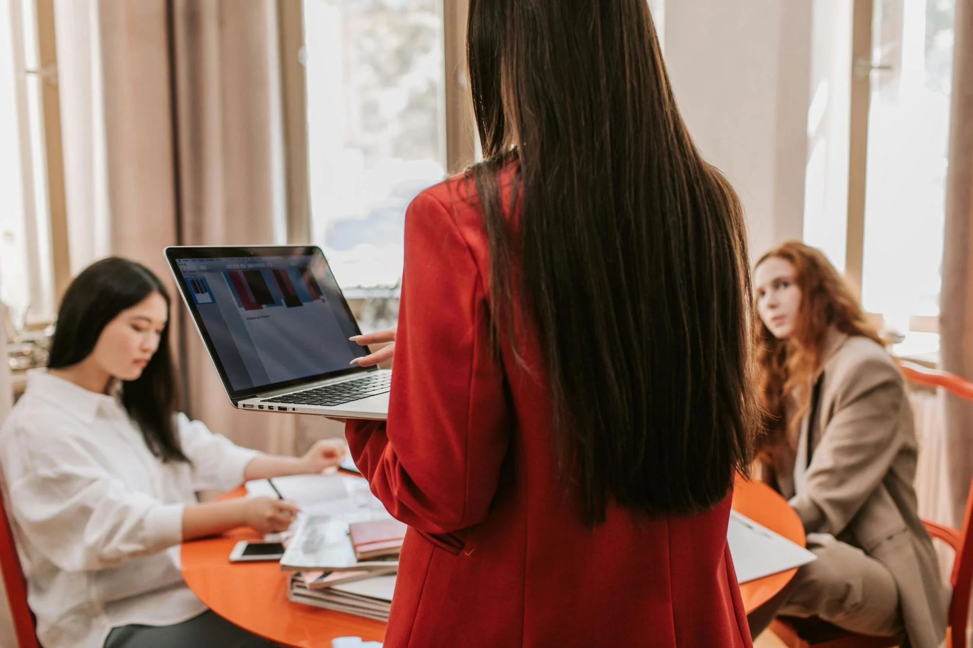 3 business women working