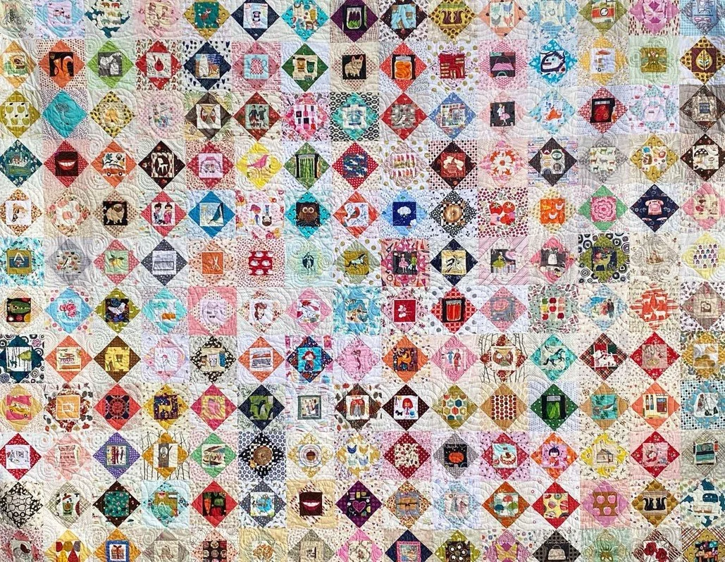 JUDGE'S CHOICE - KIMBERLY EINMO: My Fabric Has Holes, pieced by Heidi August and quilted by Patricia Burnham, 120" x 90", Lynnfield, MA