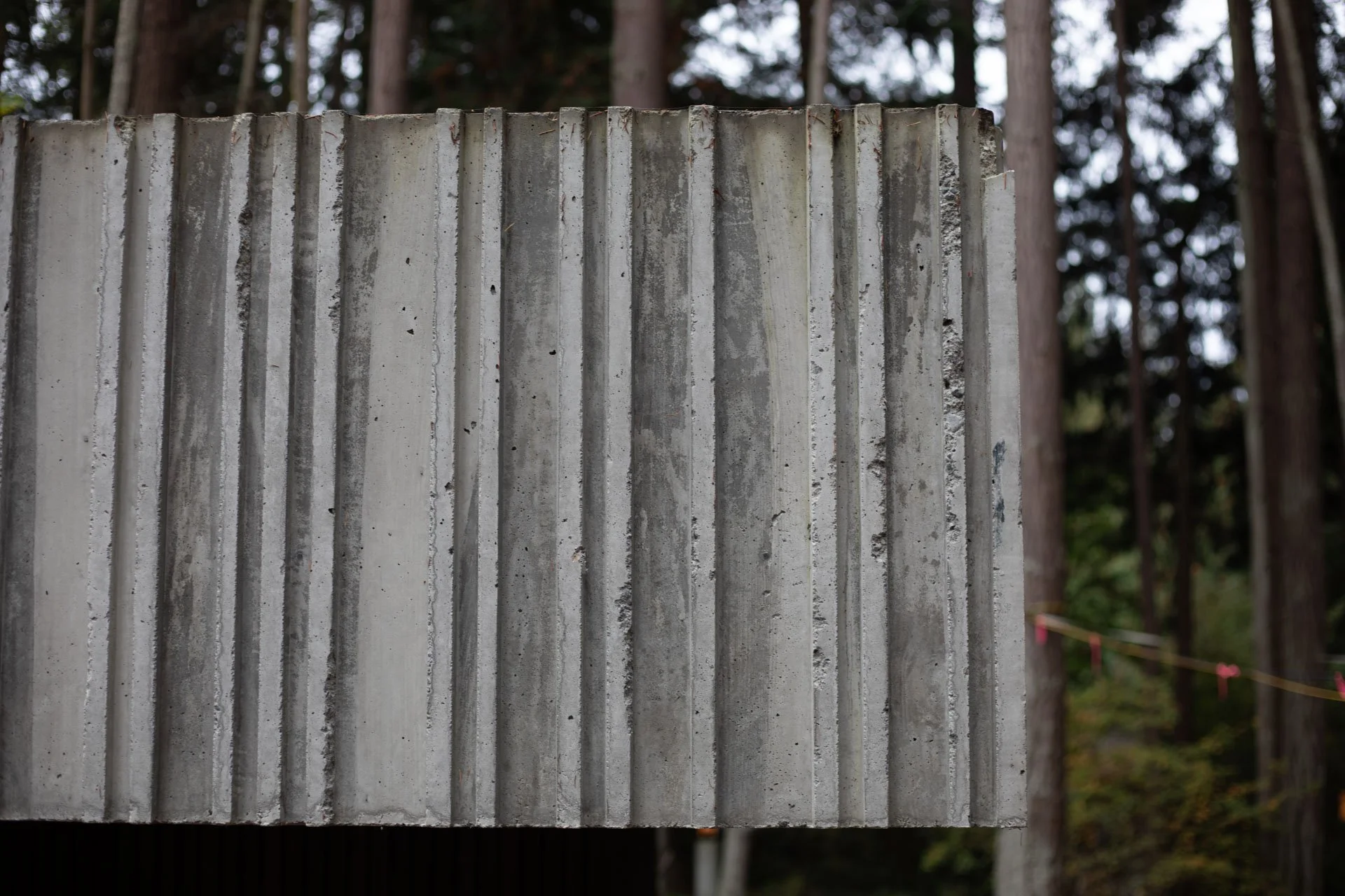 A ring beam was created using custom milled boards of various widths and thicknesses for varied appearance and relief on the surface. Architect: MW Works