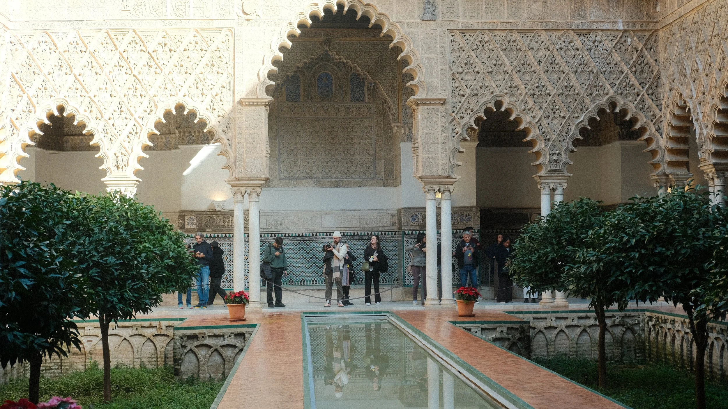  The Alcazar was built and founded starting in 900s AD when the Muslims were still ruling. Later on, in the 14th century, when the Christians took over, Pedro I of Castile hired more moorish architects from Granada to add on. 