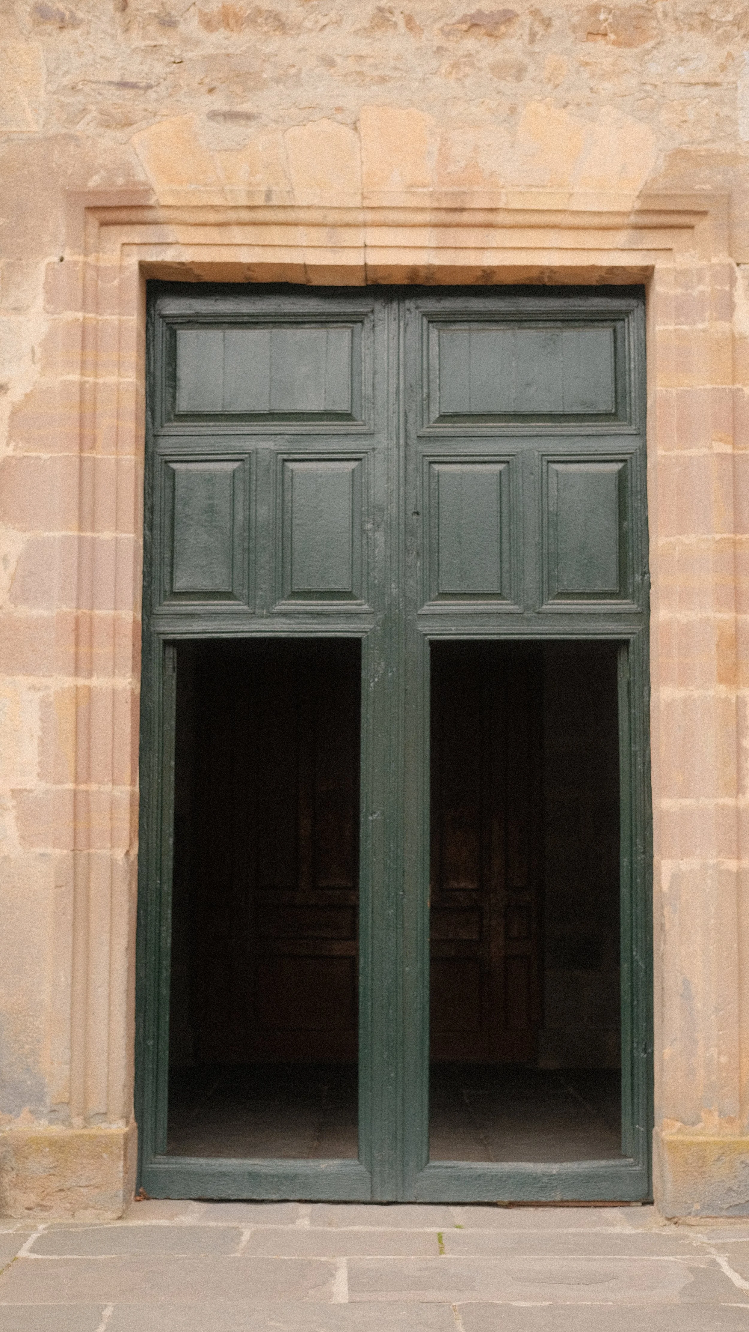  These simple green doors were the entrance to the cathedral in Potes. They emulate the simplicity of the religious decor inside as seen in the next picture. 