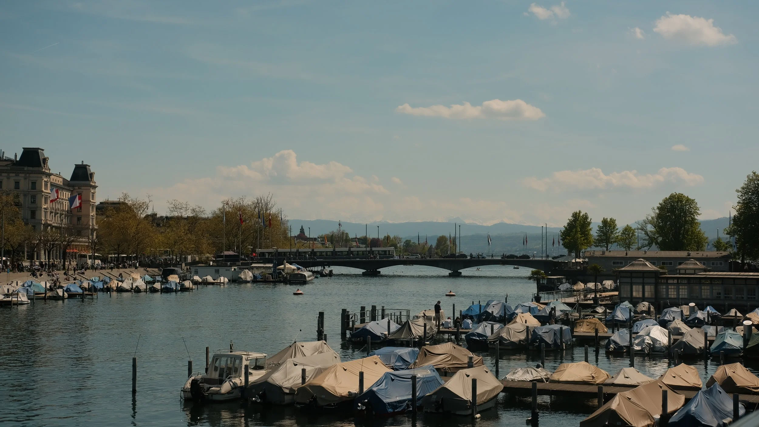  I found this spot on the ledge of the Rathausbrücke bridge to eat lunch. I was pleasantly presented with a marching band show that appeared to celebrate the beginning of spring. The fog was minimal, so I could see the mountains in the distance. 