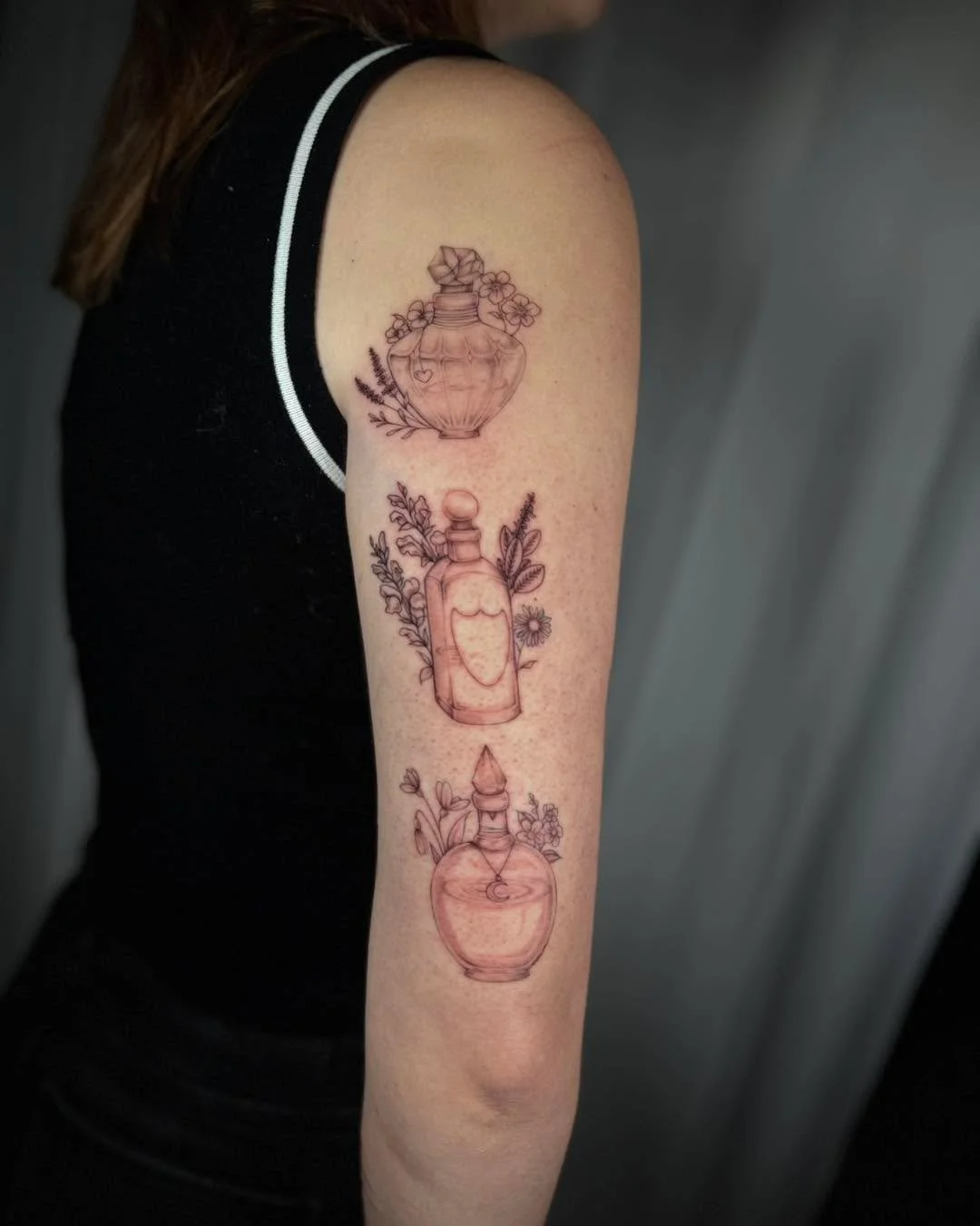 Little collection of pretty potions 🖤 🌿✨ #MadisonWI #femaletattooartist #potionbottletattoo