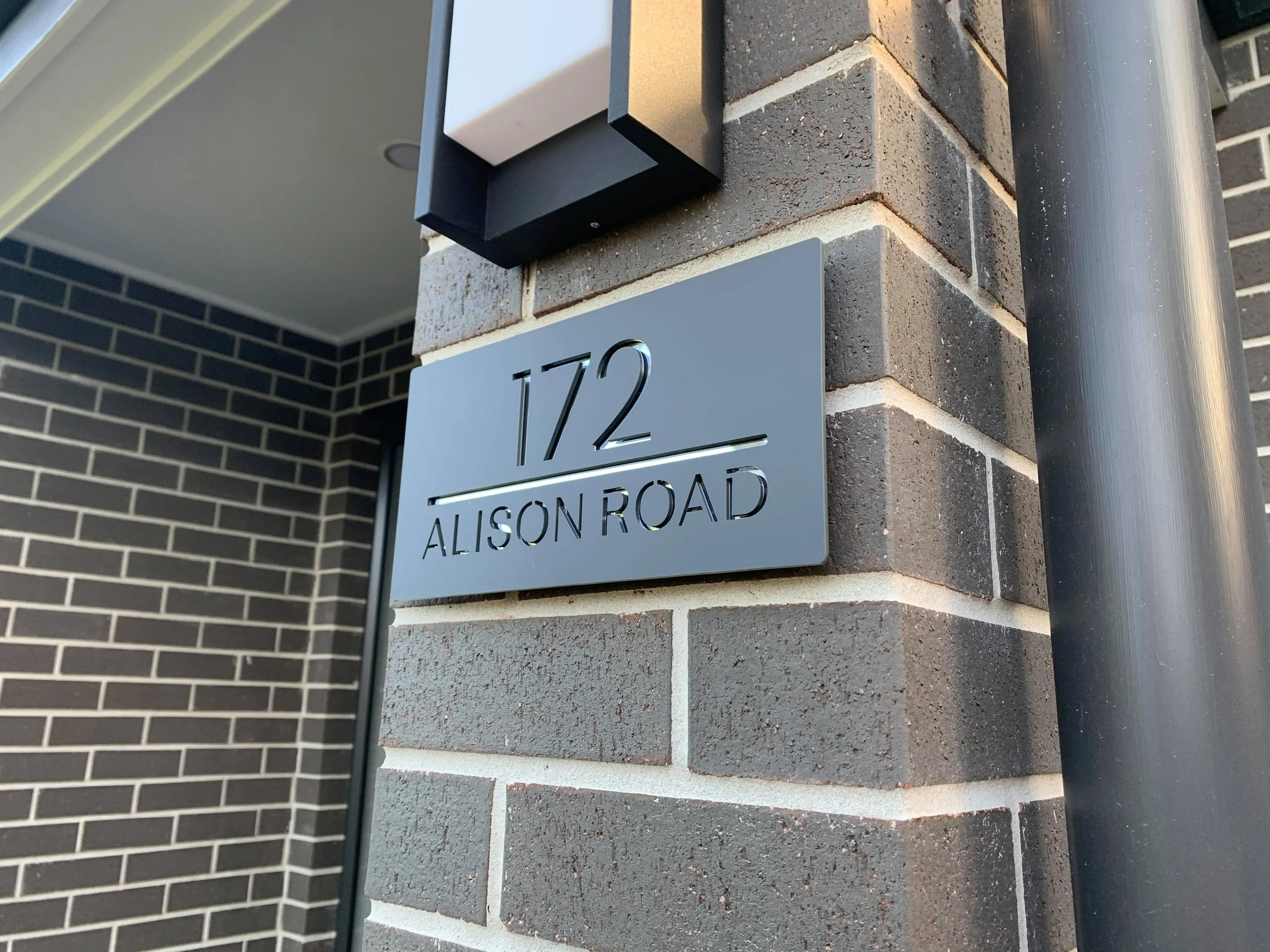 30x15cm House sign, mid grey with reflective mirror letters.