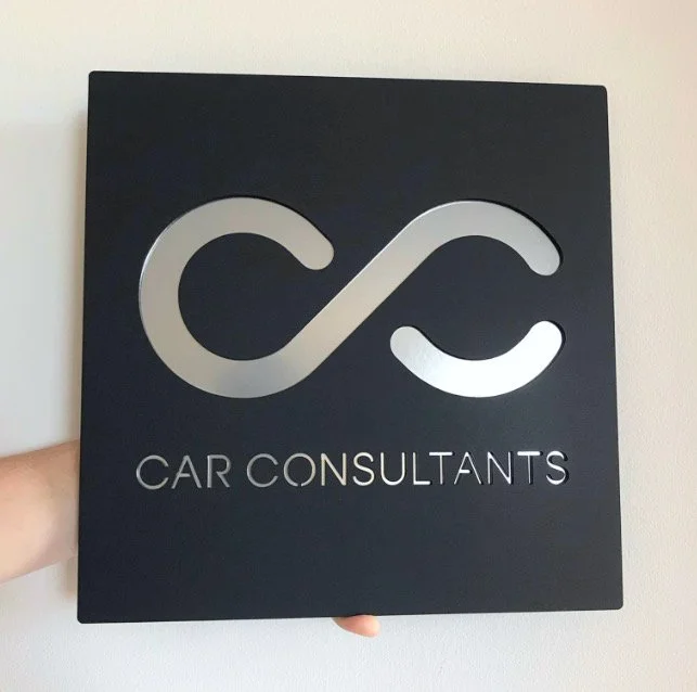 30x30cm Business sign, black with brushed silver letters.
