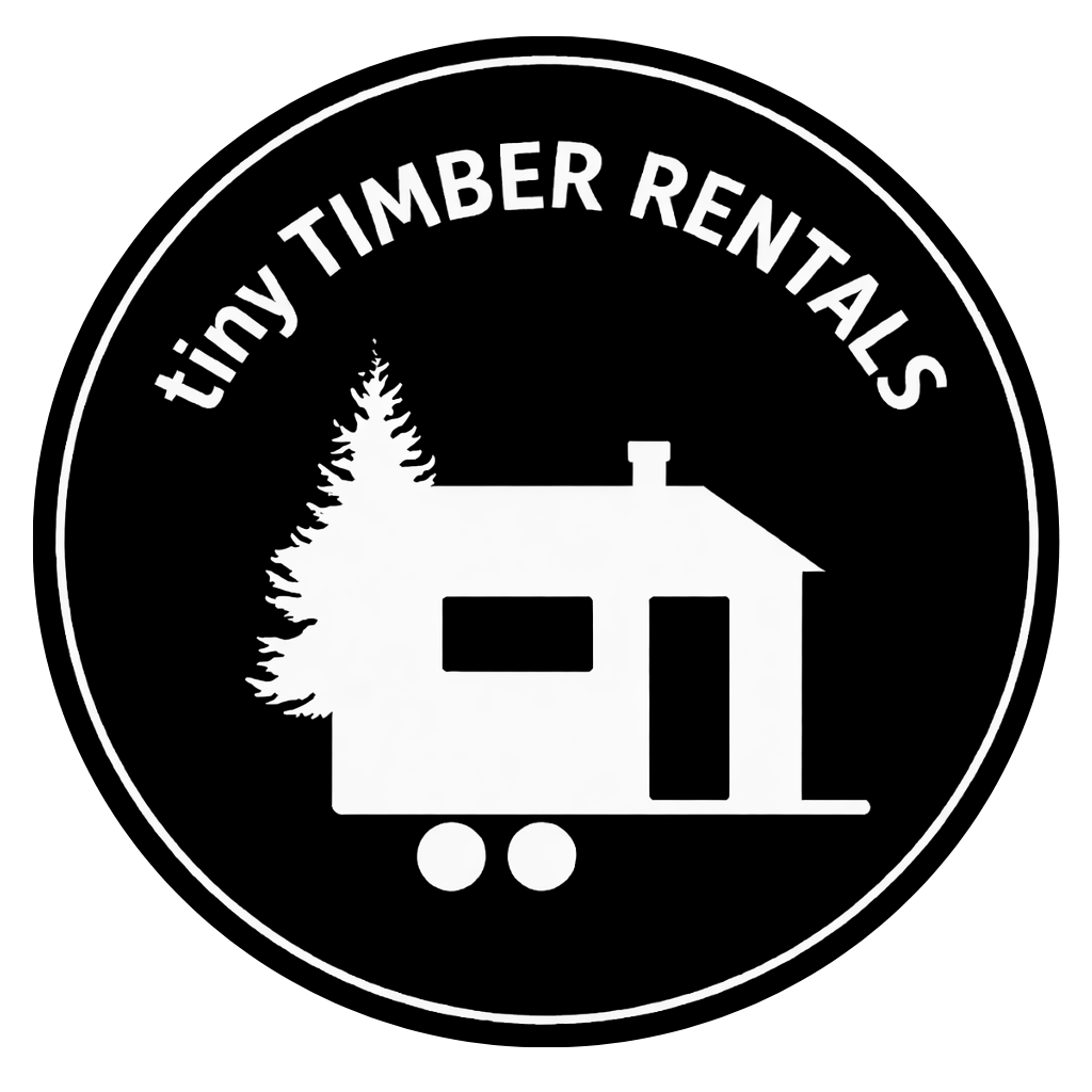 Tiny Timber Rentals circular logo badge featuring a tiny house on wheels beside a pine tree