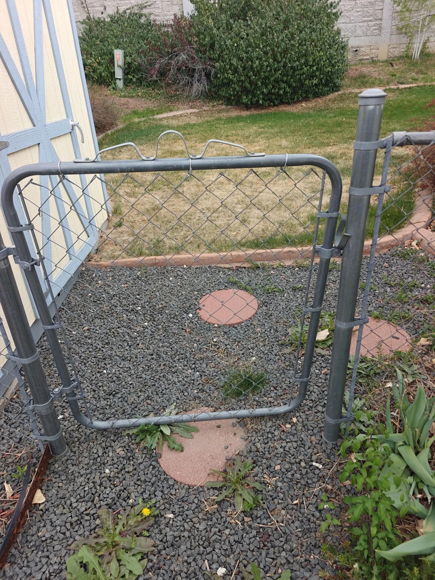 Chain-link fence gate repaired and aligned at an Arvada property