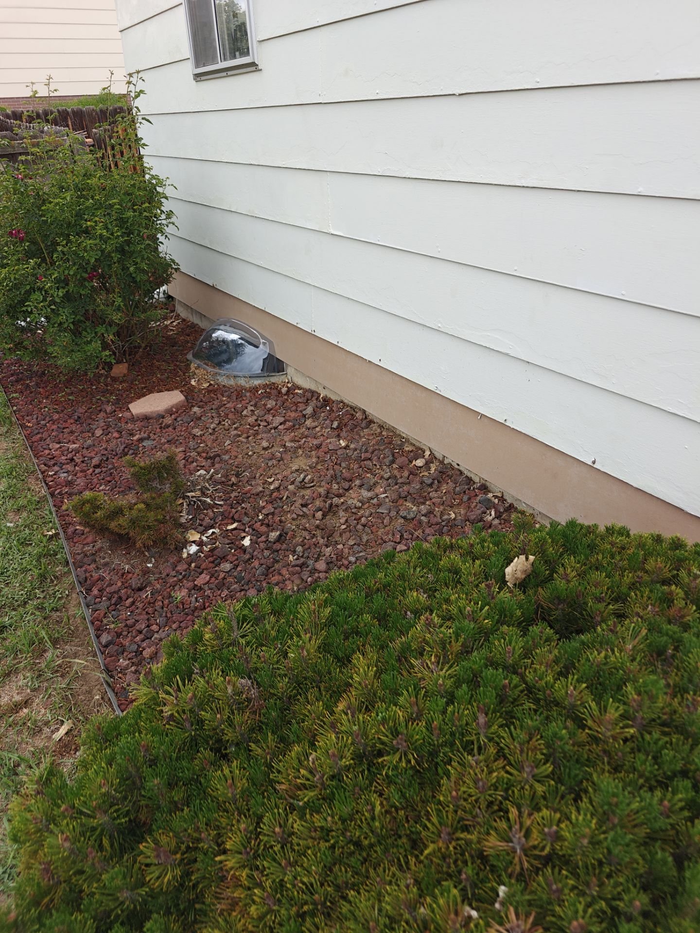 Exterior siding repair completed and prepared for full house painting.