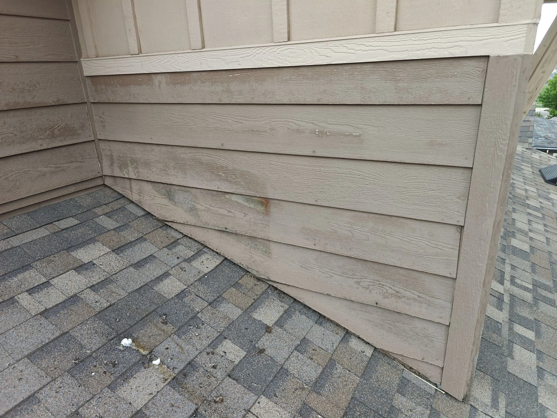 Removal of deteriorated TruWood siding during an exterior repair project in Candelas, Arvada.