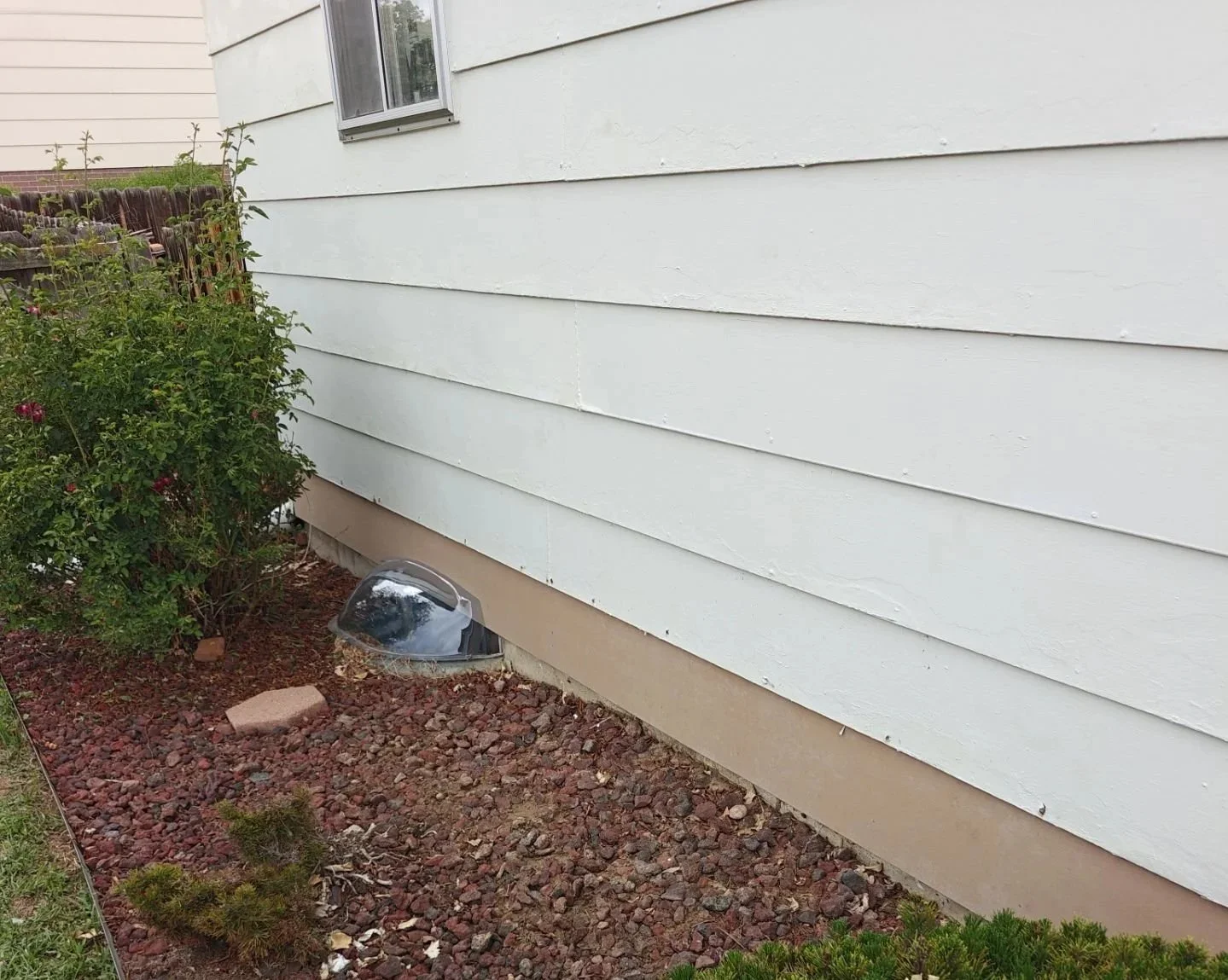 New engineered wood siding installed during lower siding replacement in Arvada.