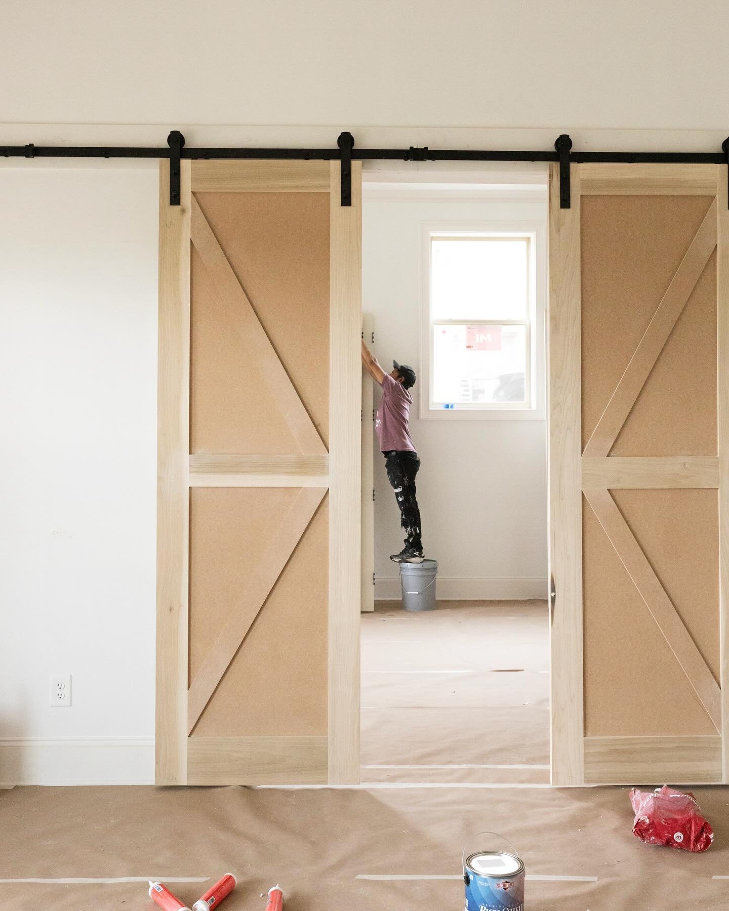 Nothing like some 8 foot barn doors to make a space really pop! 💥

Really excited to see this one come together. 👀 peep our favorite painters making sure all the little details are perfect!