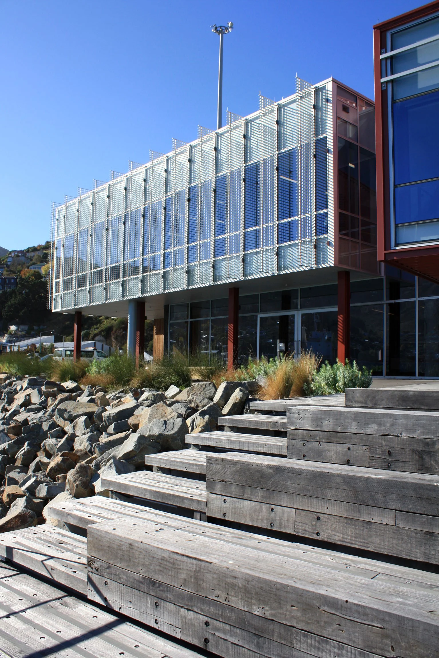 Bleachers and steps integrated into rip rap by Botanic Landscape Architects in Lyttelton, Christchurch