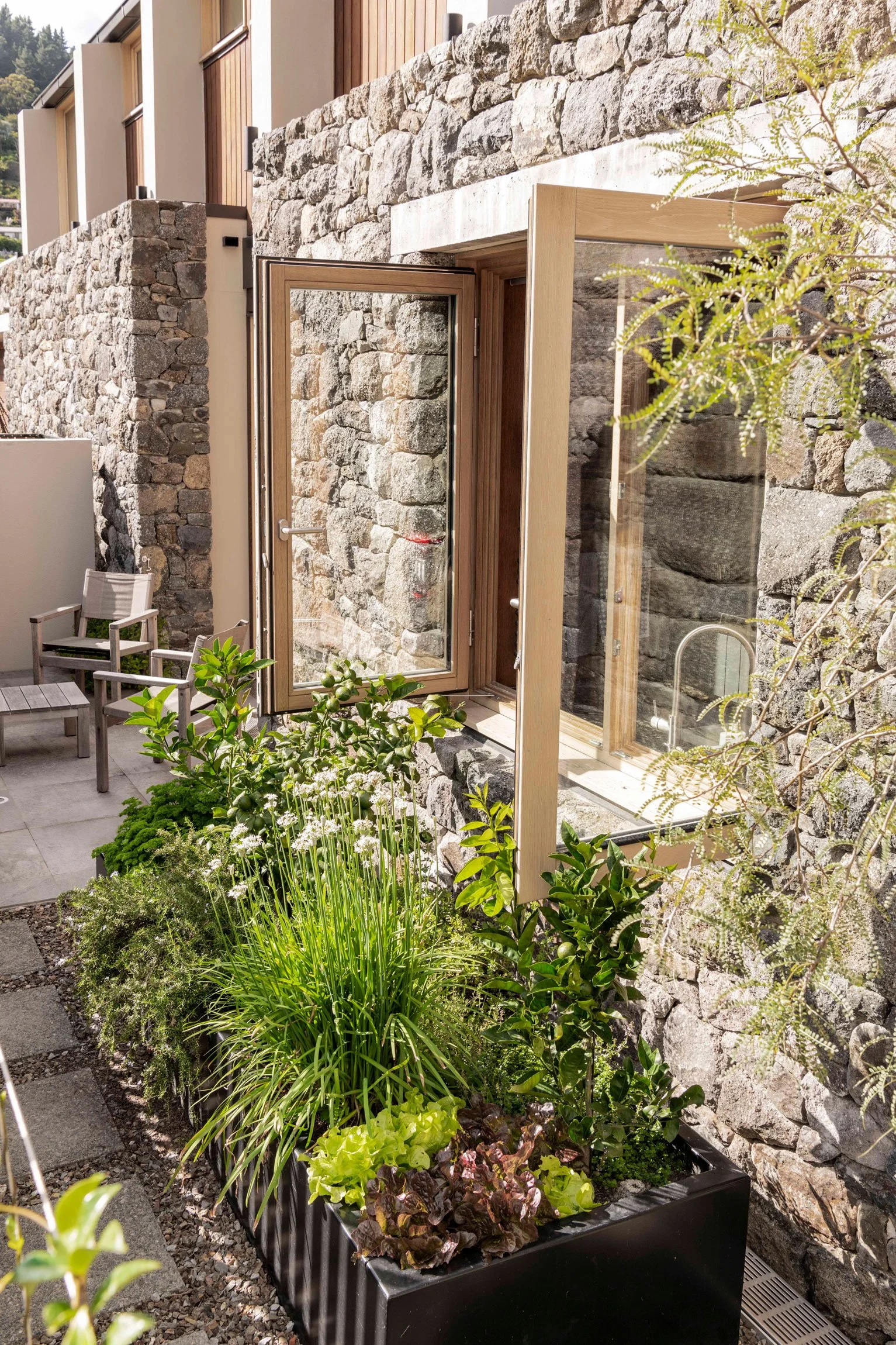 Indoor outdoor connectivity, by Botanic Landscape Architects in Lyttelton, Christchurch