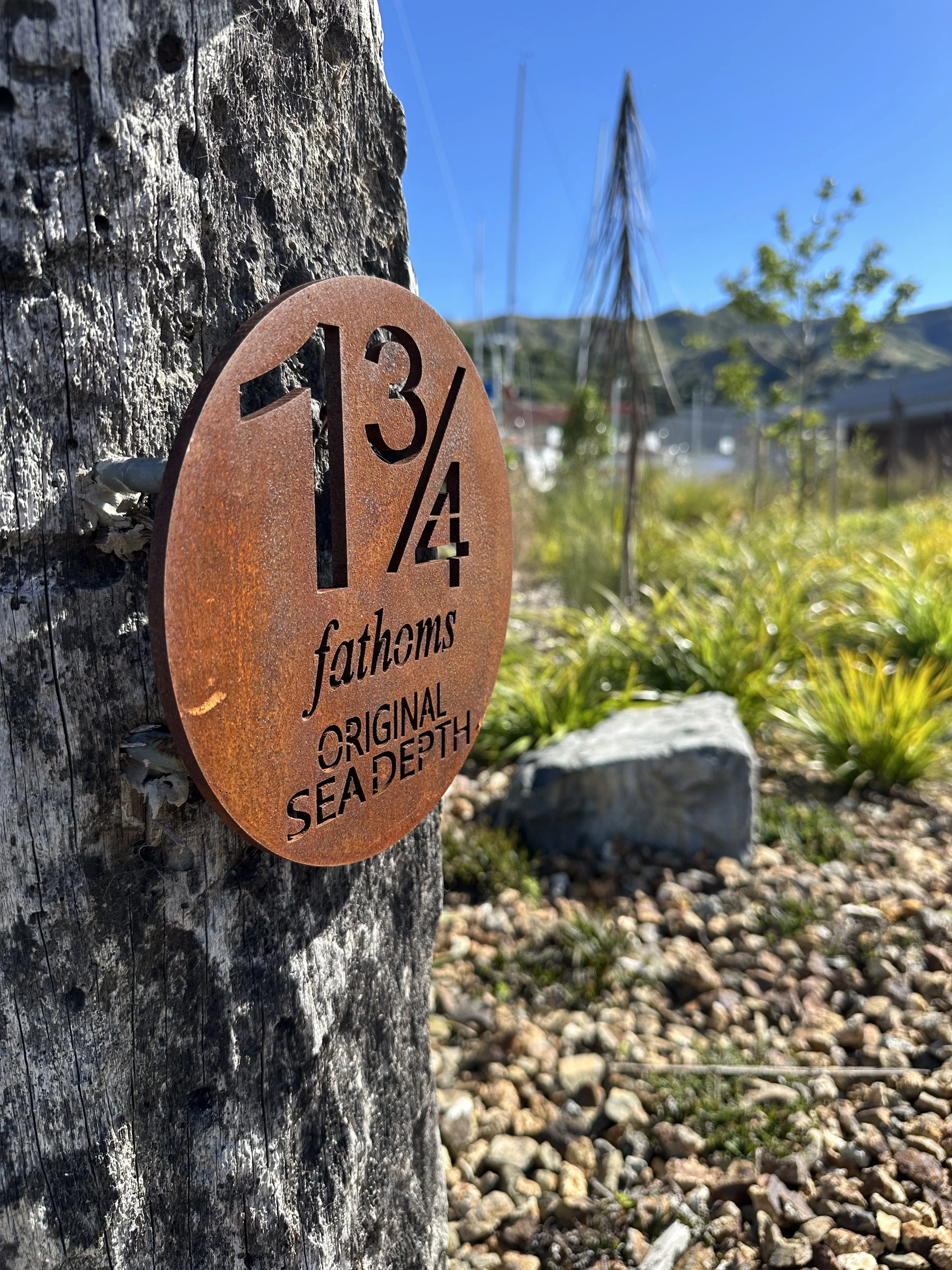 Corten steel fathom marker showing previous sea level depth, by Botanic Landscape Architects in Lyttelton, Christchurch