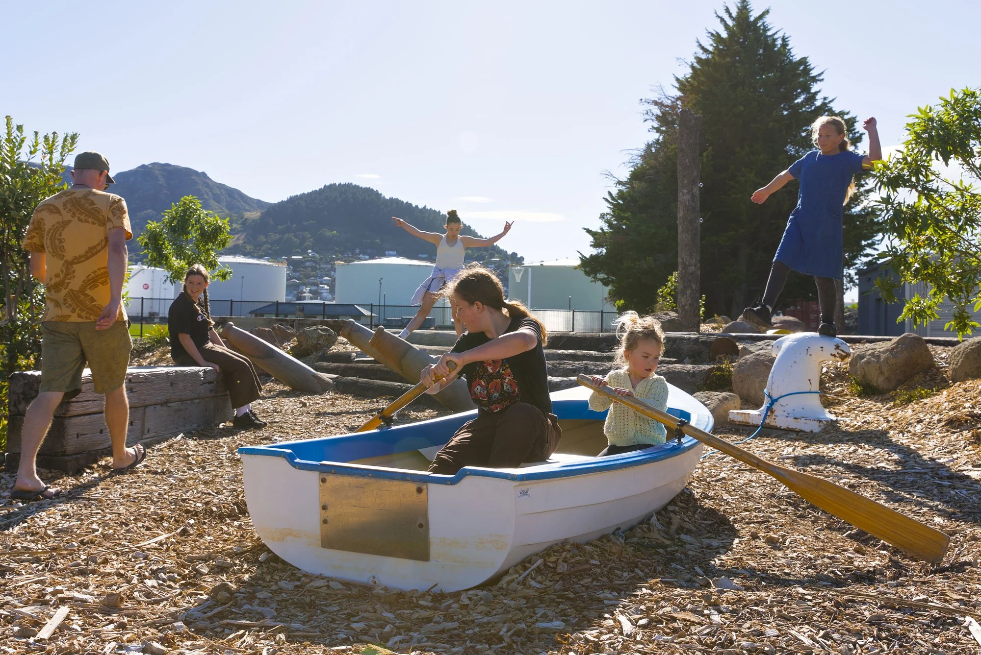 Imaginative play featuring a salvaged dingy by Botanic Landscape Architects in Lyttelton, Christchurch